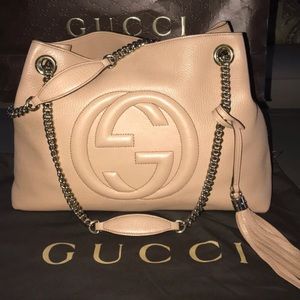 Tan Gucci leather with straps